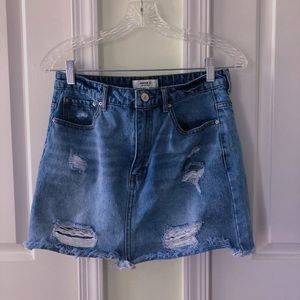 Blue distressed jean skirt
